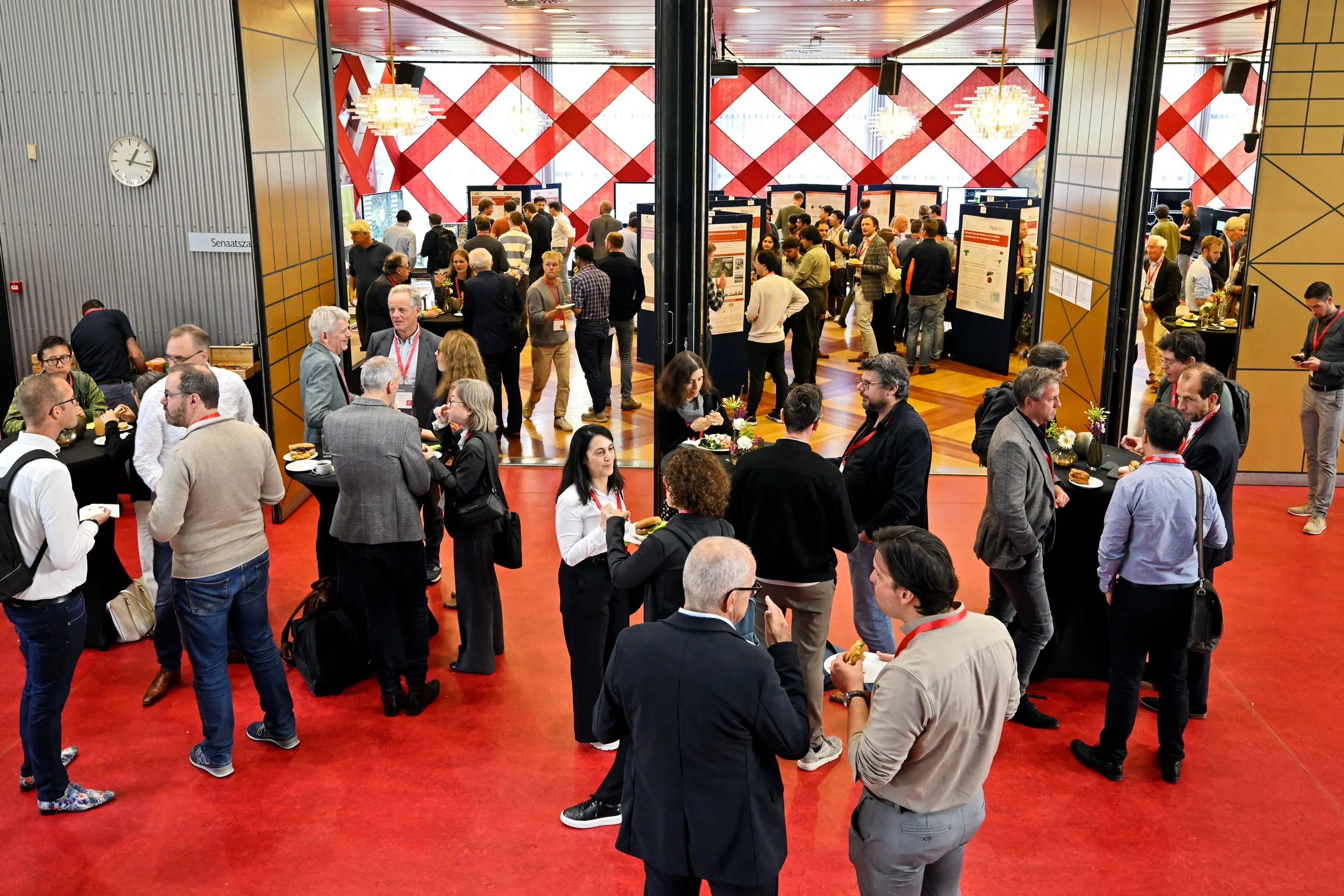 Researchers presenting work at the poster market