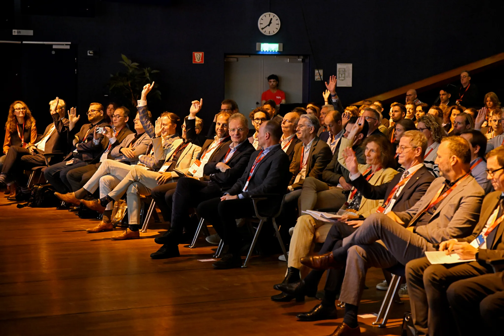 Attendees in conversation at a previous Casimir Institute event